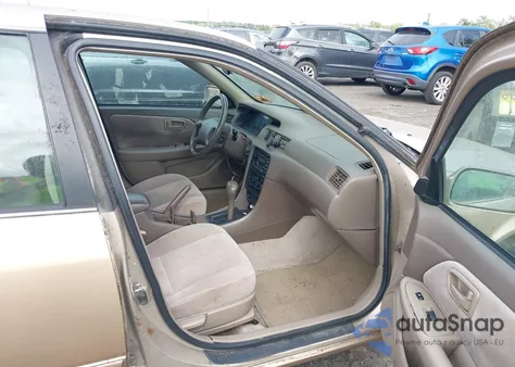 1999 Toyota Camry Le from USA, damaged, VIN 4T1BG22K9XU515253